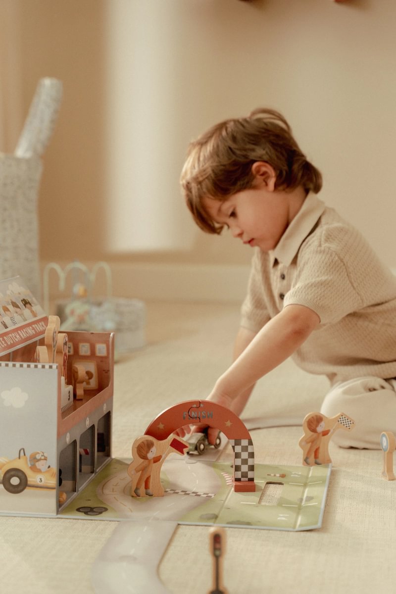 Toy suitcase with race track