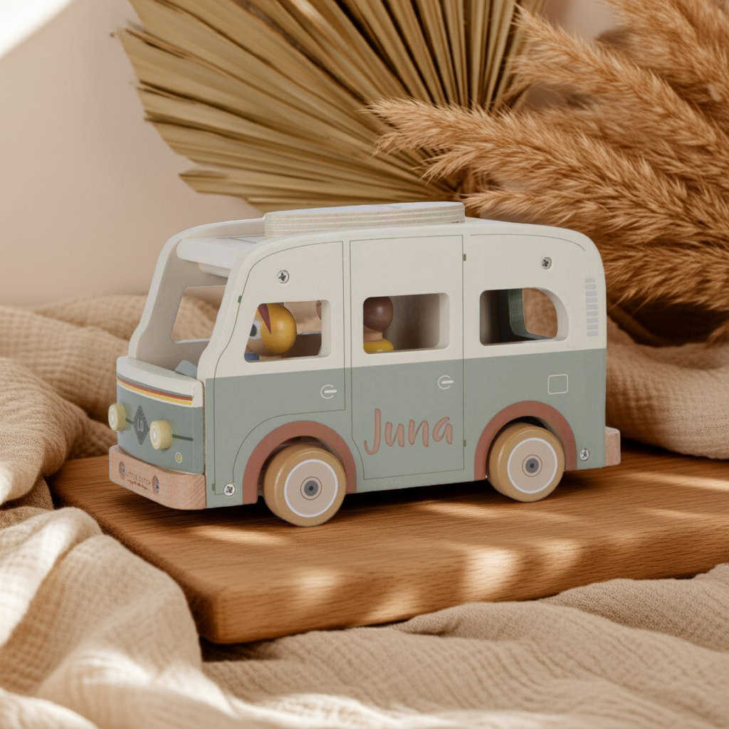 Retro camper van with toy figures