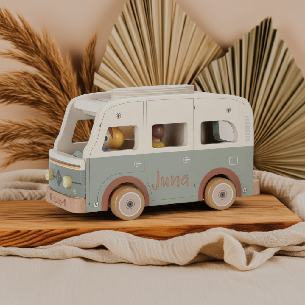 Retro camper van with toy figures