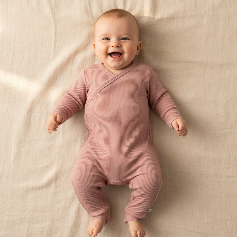 Pink wrap romper | Little Dutch
