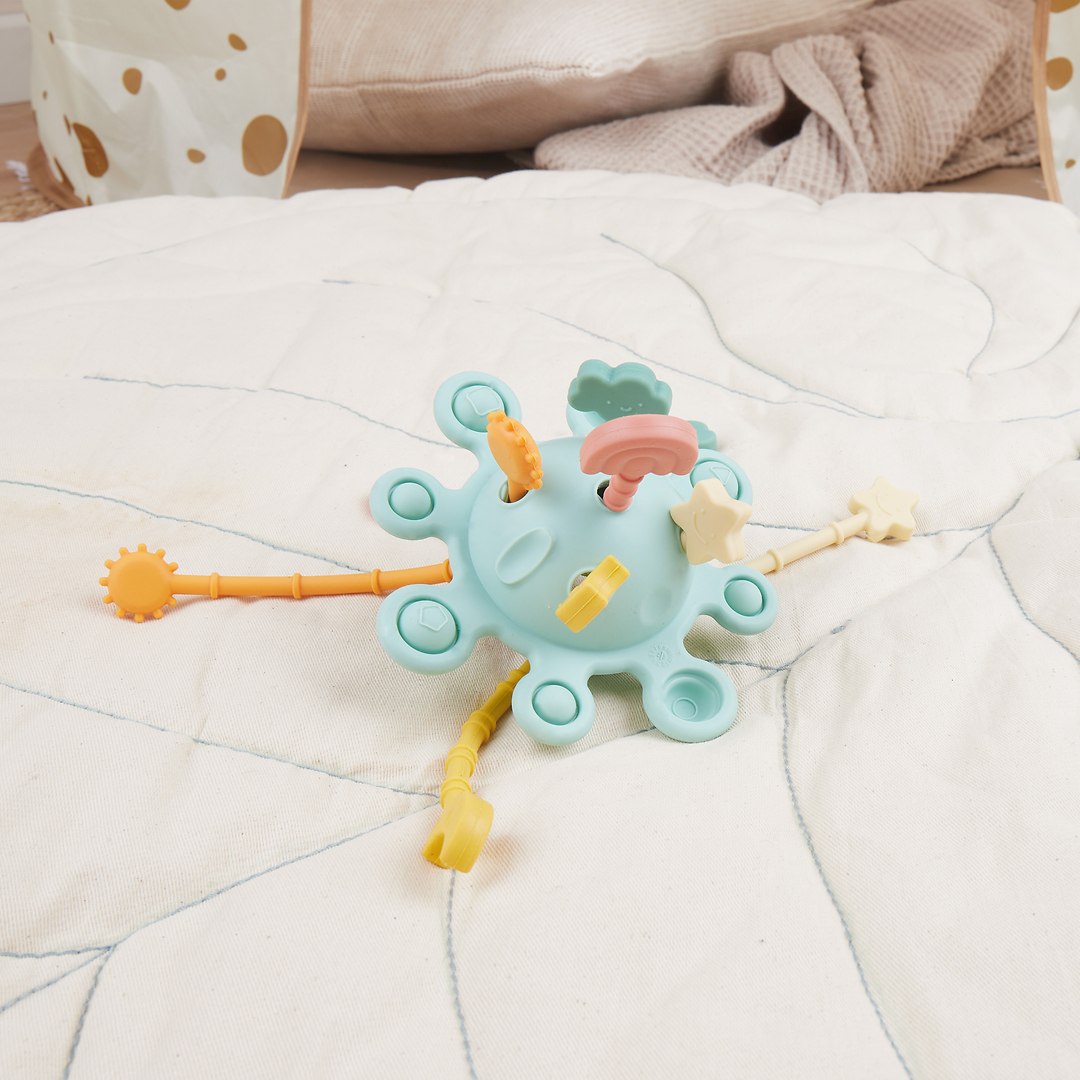 Silicone Montessori Activity Toy Planet - Eucalyptus | bieco