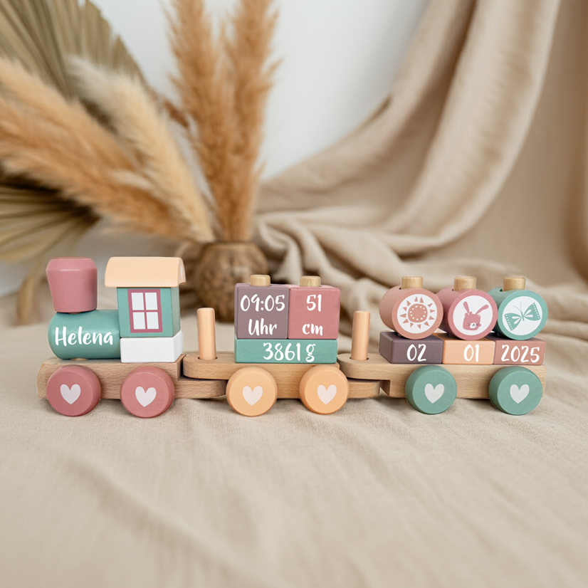 Personalisierter Holz-Zug aus Holz in Rosa und Pink mit Namen